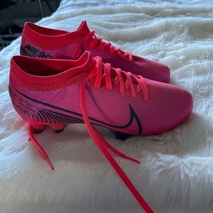 Pink Nike cleats